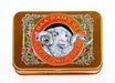 a tin can with a picture of a ram's head and the text "BAA RAM EWE Lanolin Skin Balm" around it.