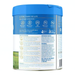 The image is a can of organic baby milk with a blue lid.