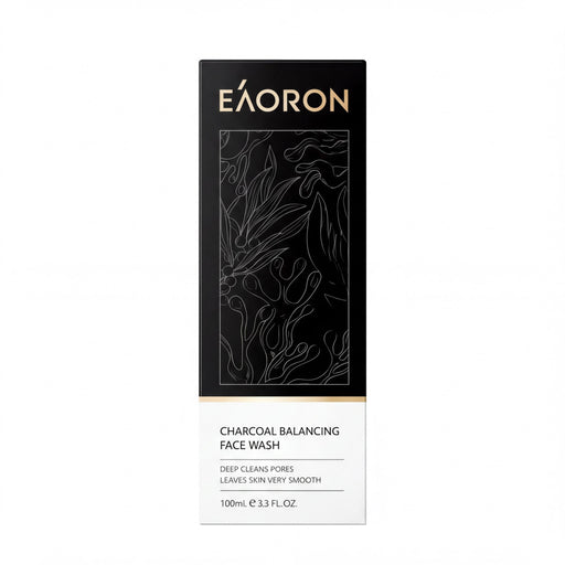 a black and white label for a charcoal balancing face wash.