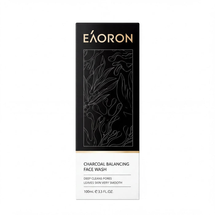 a black and white label for a charcoal balancing face wash.