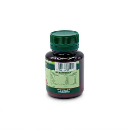 A dark brown bottle with a green cap, containing a product with a barcode and nutritional information.