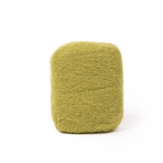 A single, square-shaped object made of a fuzzy, green material.