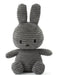 A gray, plush rabbit toy with large ears and a small nose.