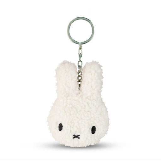 A white plush rabbit keychain with a black eye and nose design.