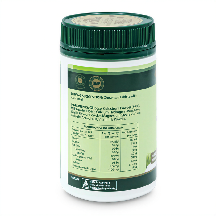 a bottle of dietary supplement with a green cap and white label.