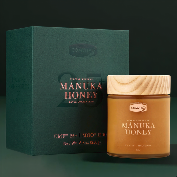 a jar of Manuka Honey next to its packaging box.