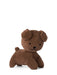 A brown stuffed animal dog toy is sitting on a white background.