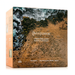 The image is a box for a thermal Australian wool quilt, featuring a landscape with a rocky coastline and ocean waves.