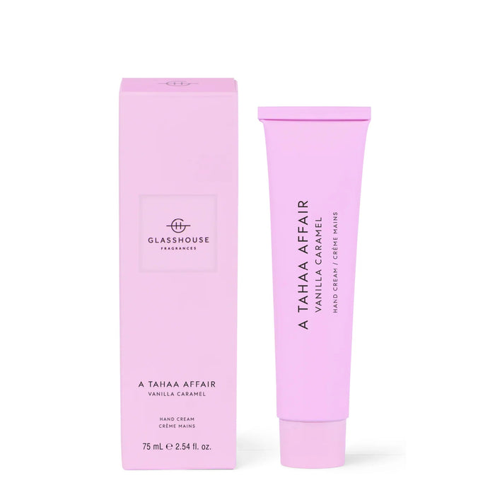 a pink box and a pink tube of a product, likely a hand cream or lotion. The box is labeled "GLASSHOUSE FRAGRANCE" and the tube is labeled "A TAHAA Affair VANILLA CARAMEL HAND CREAM MINS".