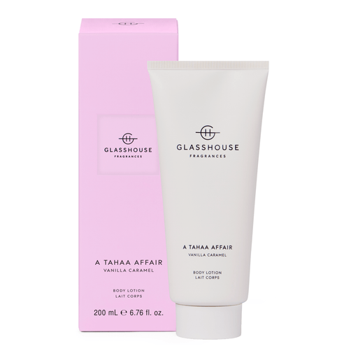 a pink box and a white tube of a product from the brand Glasshouse Fragrances. The product is a body lotion called "A TAAA Affair" that contains vanilla caramel and lait corps. The box and tube are both 200 ml in size, with a weight of 6.76 fl oz.