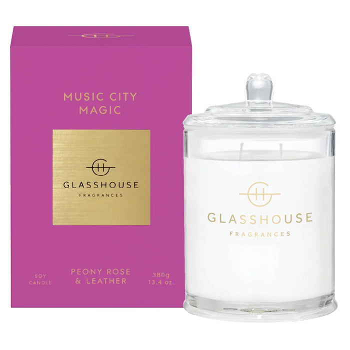 a pink box and a clear glass jar with the brand name "GLASHOUSE" printed on them.