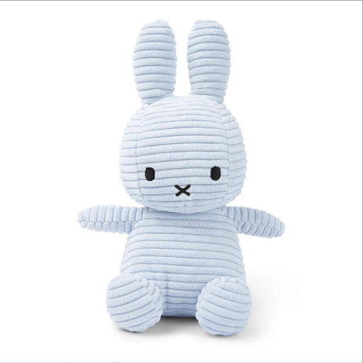 A light blue stuffed bunny toy with large ears and a black x on its face.