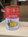 A can of Golden Ocean Brand Abalone Chicken Broth is sitting on a cardboard box.