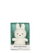 A white plush bunny toy is displayed in a green box with the text "BON TON TOYS EST. 1933".