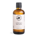A bottle of certified organic rose water against a green background.
