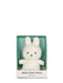 A white plush bunny toy is displayed in a green box with the text "BON TON TOYS EST. 1933".
