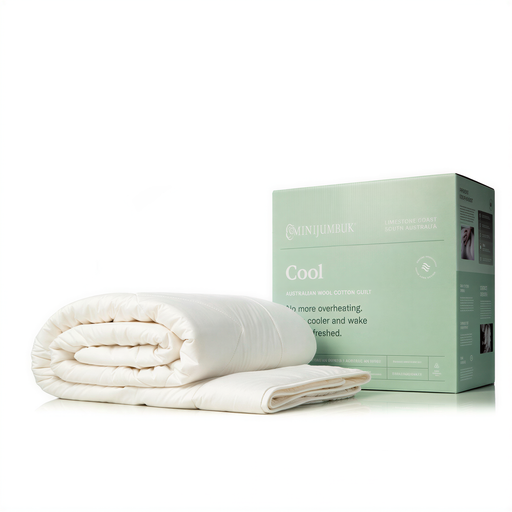 a white comforter or duvet placed on top of a green box, which is labeled as "Cool" and "LIMESTONE COAST SOUTH AUSTRALIA".