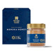 a jar of Manuka Honey next to its packaging box.