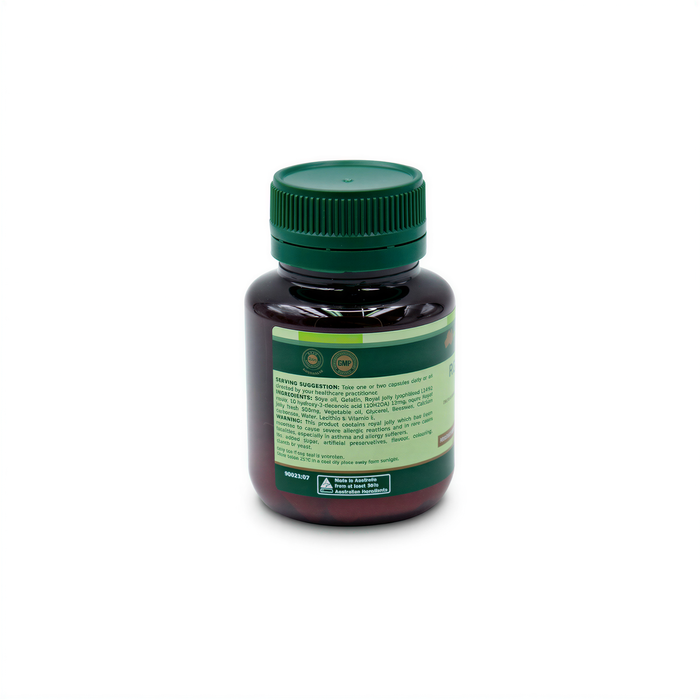 a dark brown bottle with a green cap, sitting on a white background.