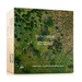 The image is a box for a product called "MINJUMBUK" that is made from Australian wool. It features a collage of images depicting a lush, green landscape with sheep grazing in the background.