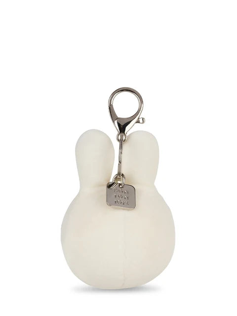 A white plush keychain in the shape of a bunny with a metal clasp and a small tag attached.