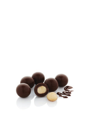 A pile of dark chocolate-covered almonds with a single almond in the center, accompanied by a drizzle of chocolate on the side.