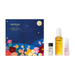a set of beauty products, including a large blue box with a night sky and flowers design, a yellow bottle, and two smaller bottles.
