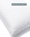 A pillow with a medium/high profile design, featuring a white circular pattern.