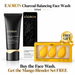 The image is an advertisement for a product called "Eaaron Charcoal Balancing Face Wash" and a free mango blender set. It features a black tube of the product, a black box, and a yellow box containing three mango blender sets.