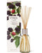 a glass diffuser with a clear glass jar filled with blackberry and plum-scented oil, accompanied by its packaging box.