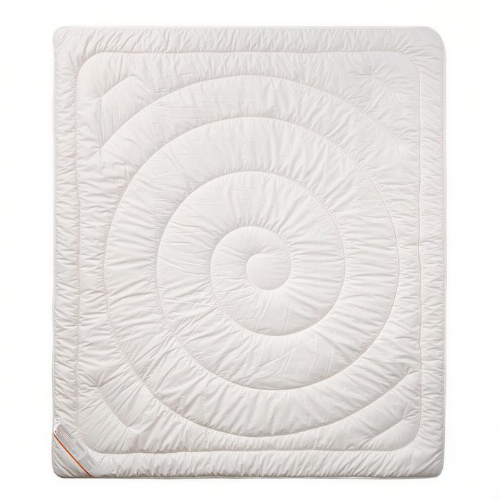 a white, square-shaped bedding item with a spiral pattern on it.