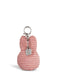 A pink, coiled keychain with a silver metal clasp and a small tag attached to it.