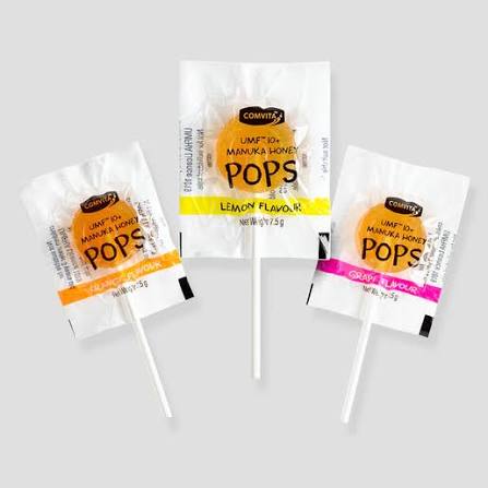 three LESS THAN 500 characters of text, with the focus on the three different flavors of popsicles.