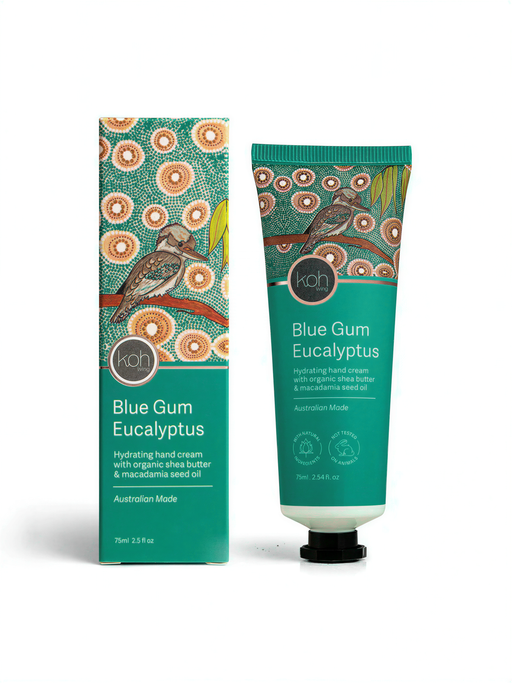 two tubes of hand cream, one standing upright and the other lying on its side, both with a green and orange color scheme.